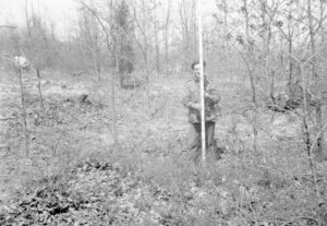 Ralph Solecki surveying at the Fort Corchaug site